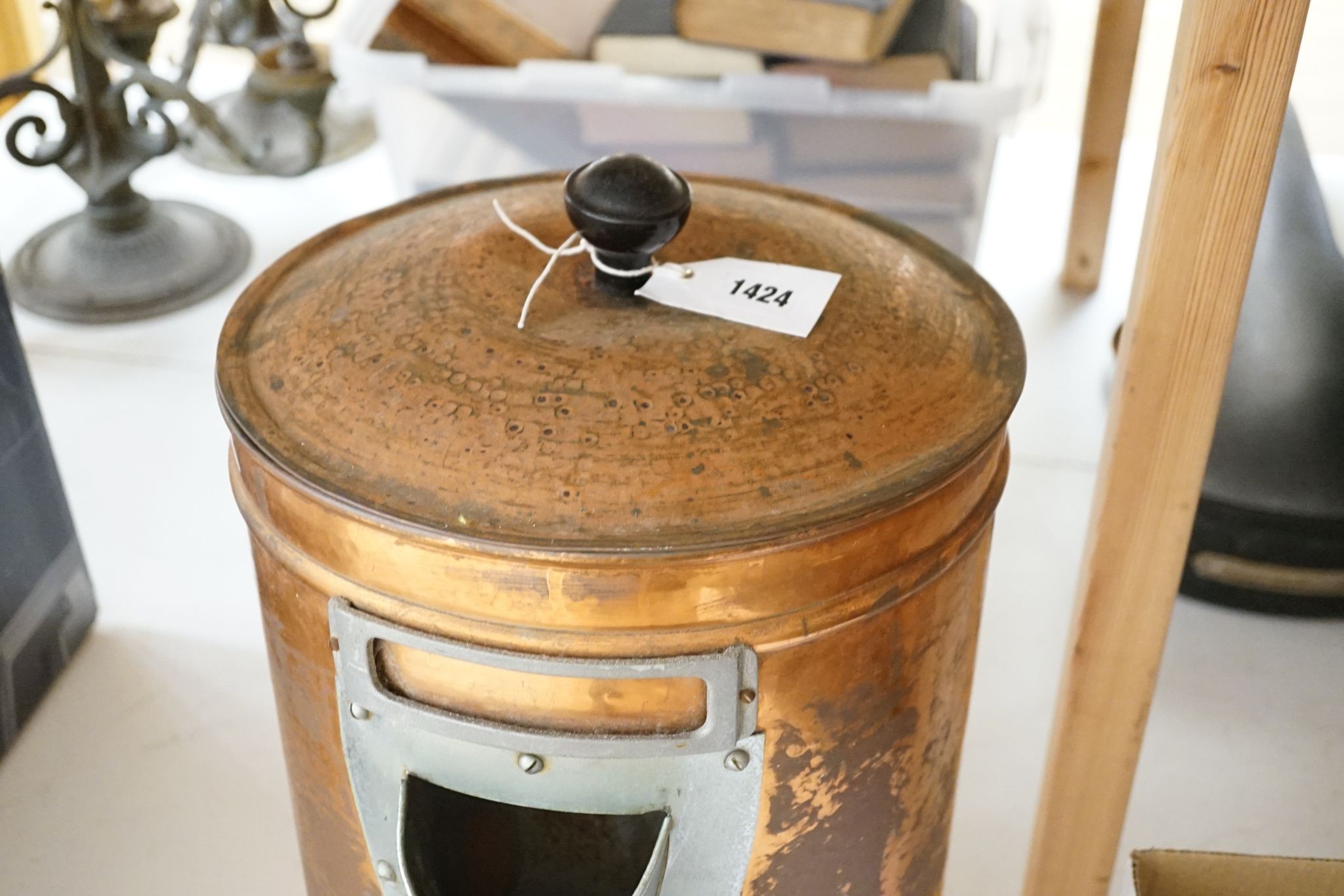 A copper coffee bean dispenser, 60 cms high.